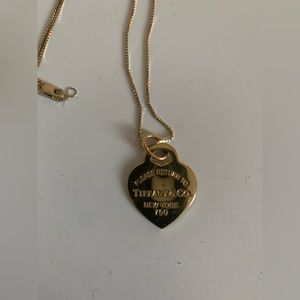 Yellow gold Tiffany heart pendent